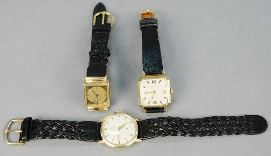 Three wrist watches, Glycine 14K gold wrist watch,: Three wrist watches, Glycine 14K gold wrist watch, Hamilton 14K gold wrist watch and Omega automatic gold filled wrist watch.