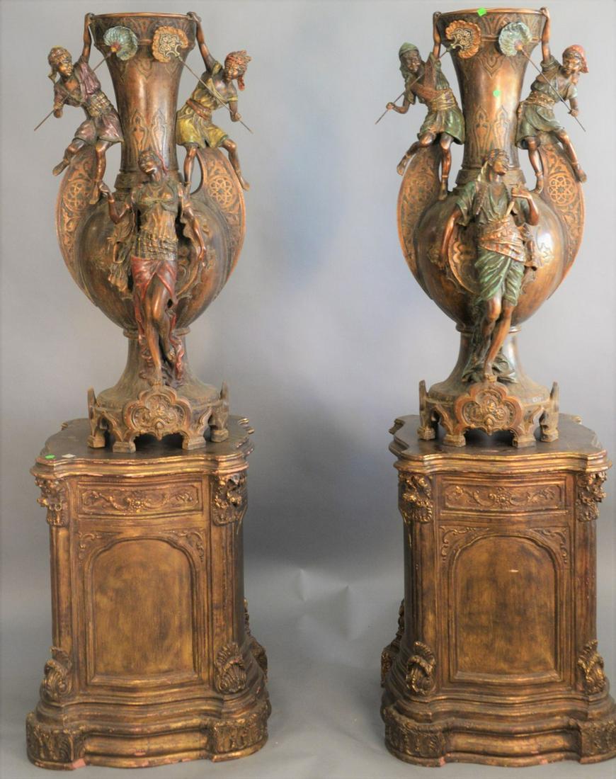 Pair of monumental metal orientalist style urns with (1 of 5)