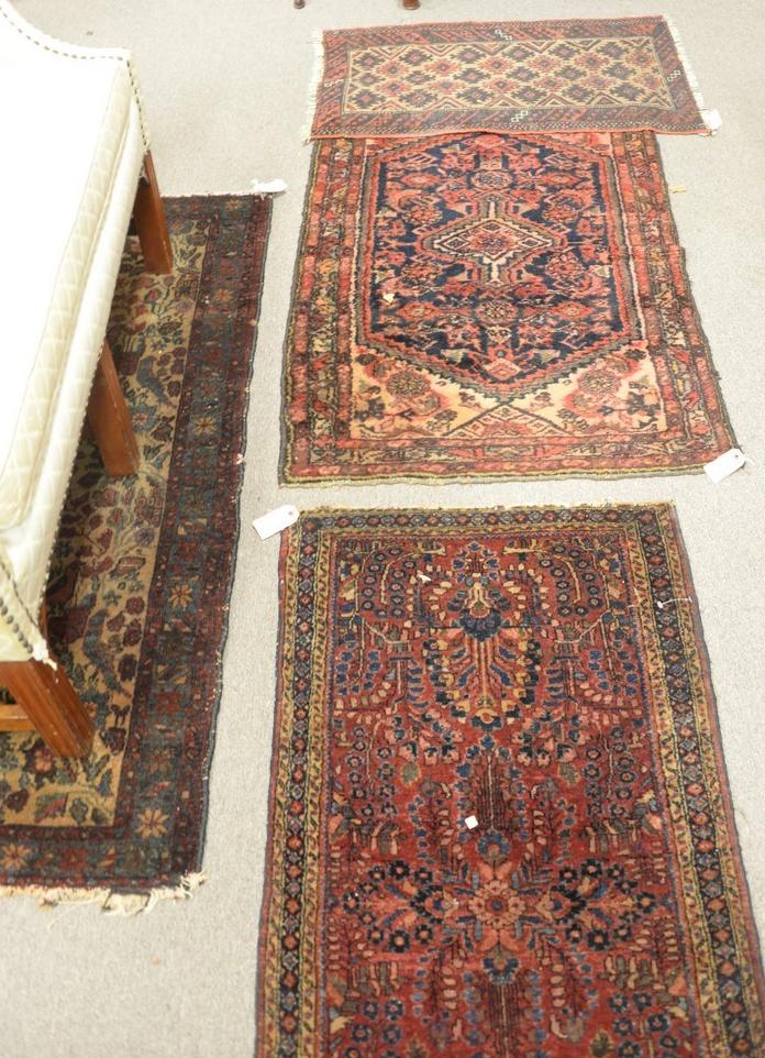 Four piece lot of Oriental throw rugs, to include one (1 of 3)