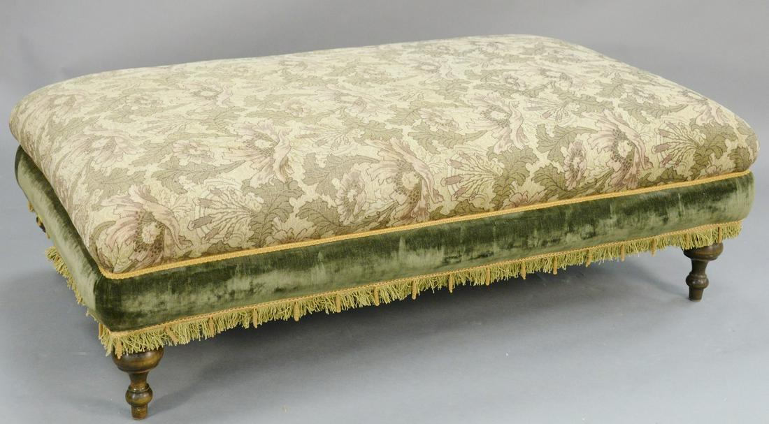Tapestry upholstered large ottoman. (one 2" tear). ht.: Tapestry upholstered large ottoman. (one 2" tear). ht. 20 in., top: 35" x 56". Provenance: Former home of Mel Gibson, Old Mill Rd, Greenwich, CT