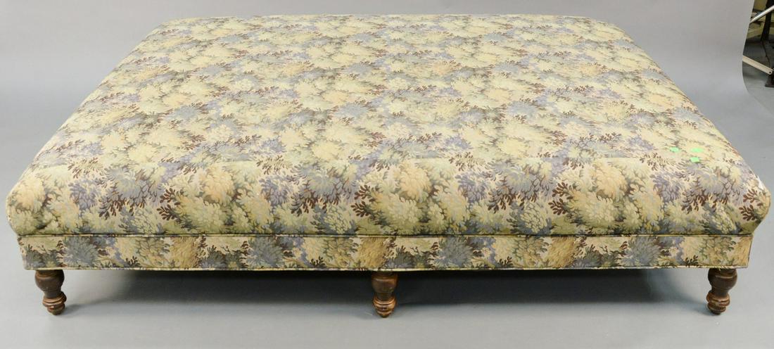 Oversize footstool with tapestry style upholstery. ht.: Oversize footstool with tapestry style upholstery. ht. 18 in., top: 60" x 74". Provenance: Former home of Mel Gibson, Old Mill Rd, Greenwich, CT
