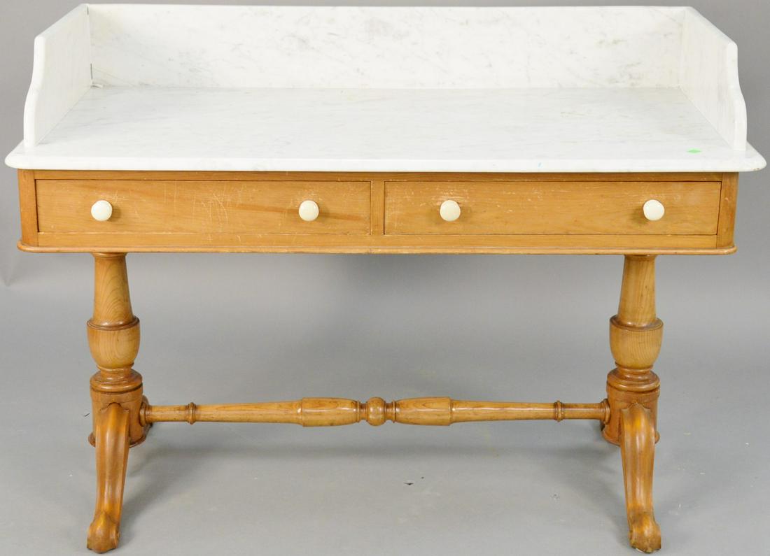 Pine wash stand with marble top. ht. 33 1/2 in., wd. 48: Pine wash stand with marble top. ht. 33 1/2 in., wd. 48 in. Provenance: Former home of Mel Gibson, Old Mill Rd, Greenwich, CT
