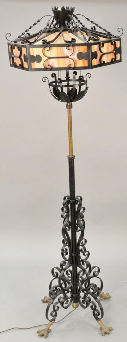 Iron piano floor lamp now fitter with slag glass shade: Iron piano floor lamp now fitter with slag glass shade mounted with metal. ht. 72 in., dia. 24 in.