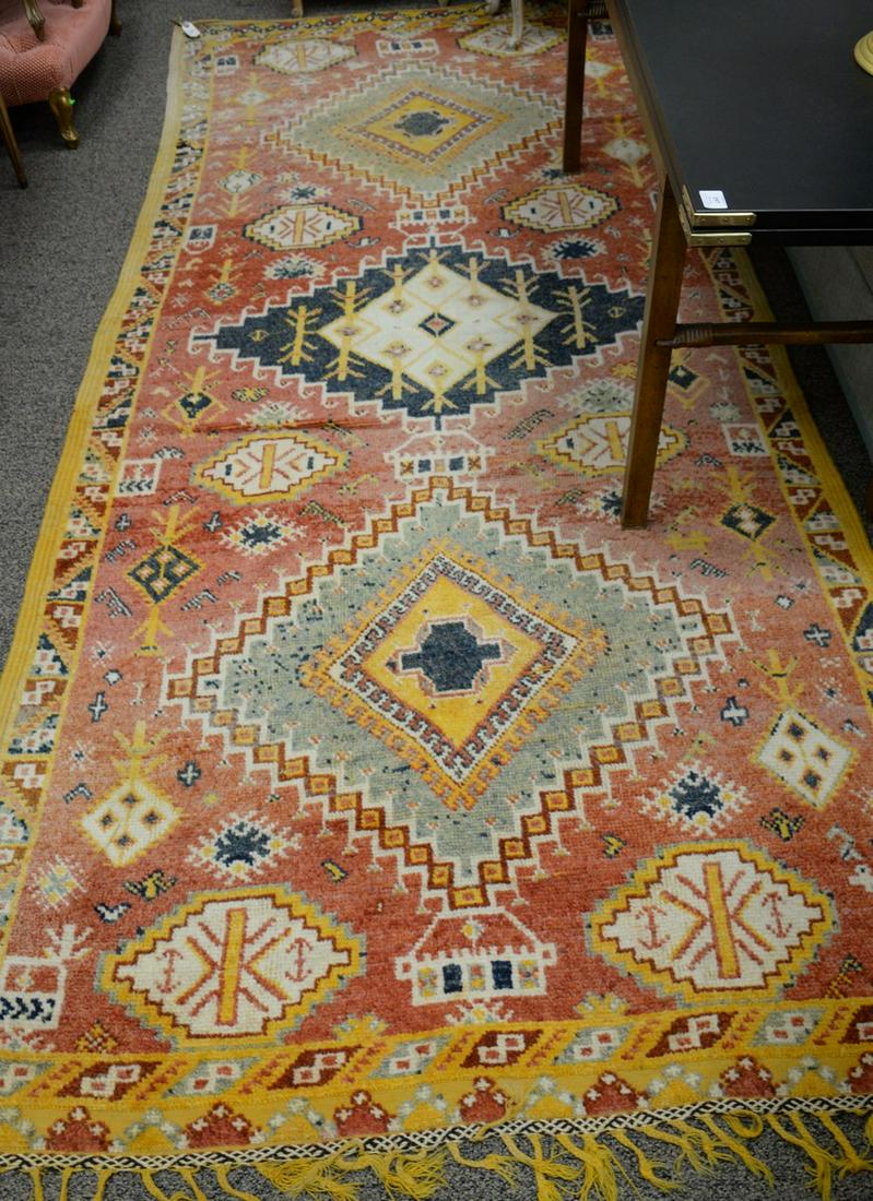 Three piece lot to include Moroccan oriental area rug.: Three piece lot to include Moroccan oriental area rug. 5' x 11' 4", along with two Oriental throw rugs 2' 5" x 3' 10" and 5' x 7' 5". Provenance: Former home of Mel Gibson, Old Mill Rd, Greenwich, CT