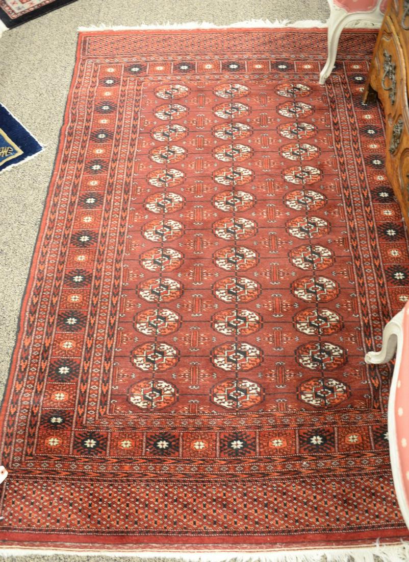 Bokhara oriental throw rug. 4" x 6' 5". Provenance:: Bokhara oriental throw rug. 4" x 6' 5". Provenance: Former home of Mel Gibson, Old Mill Rd, Greenwich, CT