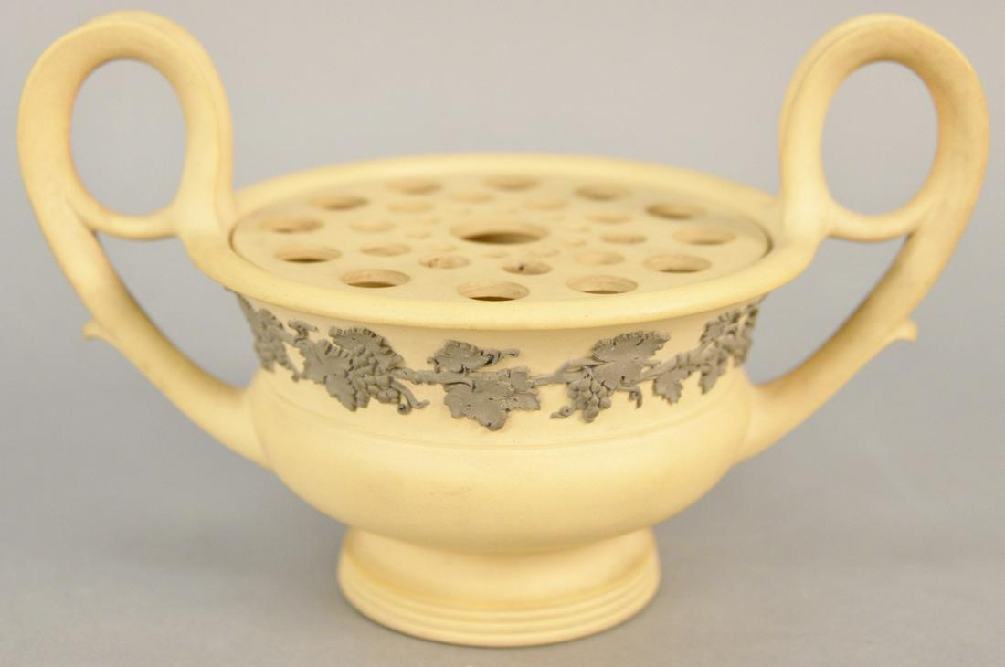 Wedgwood Jasperware flower frog, having two handles,: Wedgwood Jasperware flower frog, having two handles, pierced cover, grape and leaf design. ht. 5 1/2 in. Provenance: Former home of Mel Gibson, Old Mill Rd, Greenwich, CT