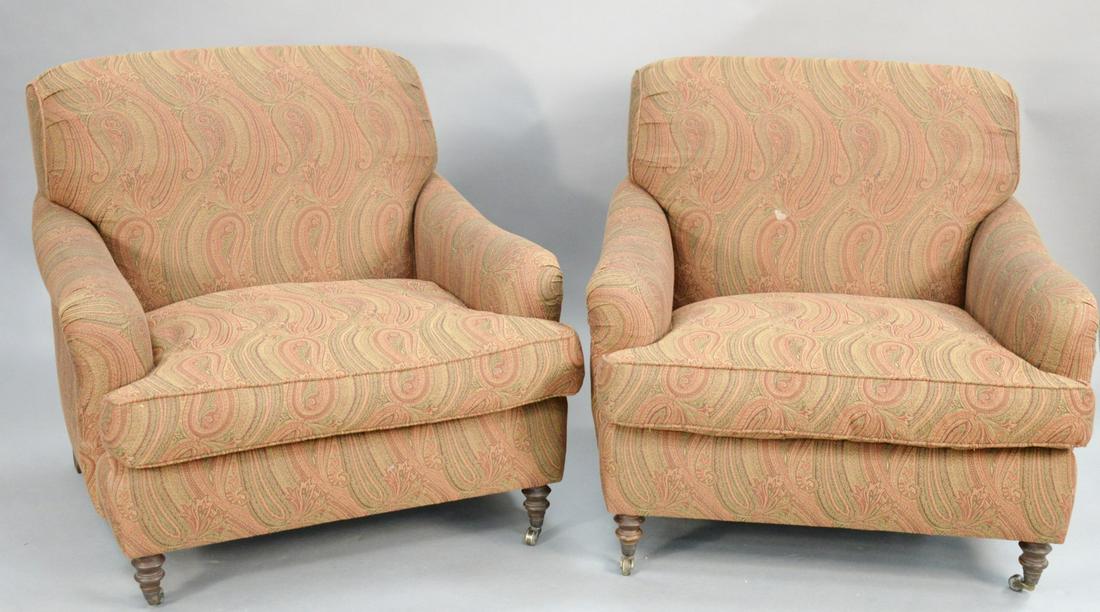 Pair of custom upholstered easy chairs. ht. 36 in., wd.: Pair of custom upholstered easy chairs. ht. 36 in., wd. 38 in. Provenance: Former home of Mel Gibson, Old Mill Rd, Greenwich, CT