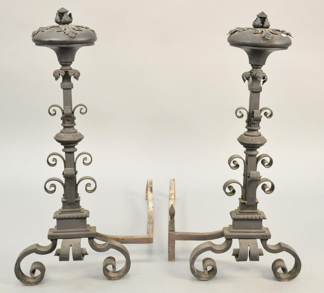Pair of tall iron andirons. ht. 39 in. Provenance:: Pair of tall iron andirons. ht. 39 in. Provenance: Former home of Mel Gibson, Old Mill Rd, Greenwich, CT