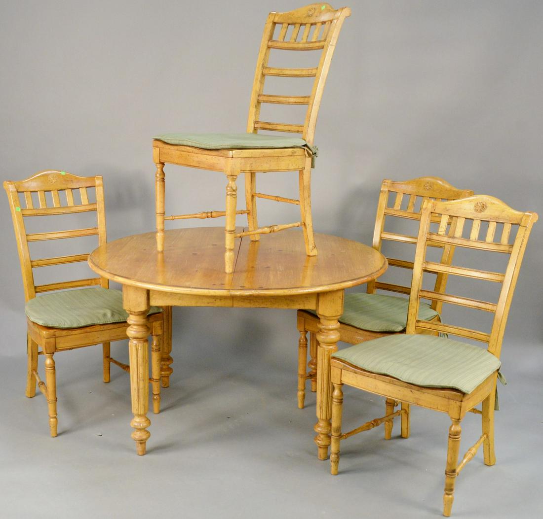 Five piece pine round table with four chairs. ht. 29: Five piece pine round table with four chairs. ht. 29 1/2 in., dia. 50 in. Provenance: Former home of Mel Gibson, Old Mill Rd, Greenwich, CT