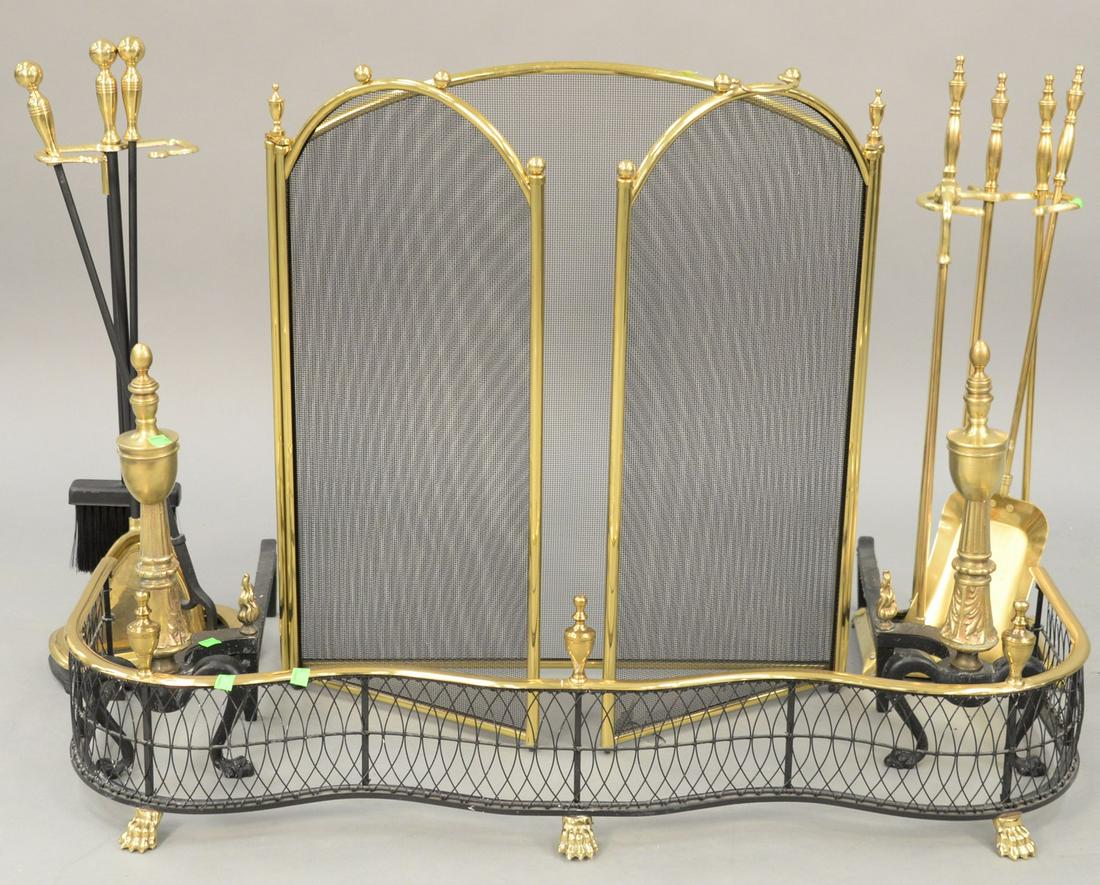 Fire place grouping to include pair of andirons,: Fire place grouping to include pair of andirons, fender, screen and two sets of tools. fender lg. 42 in. Provenance: Estate of William and Teresa Patton, Lake Ave Greenwich, CT