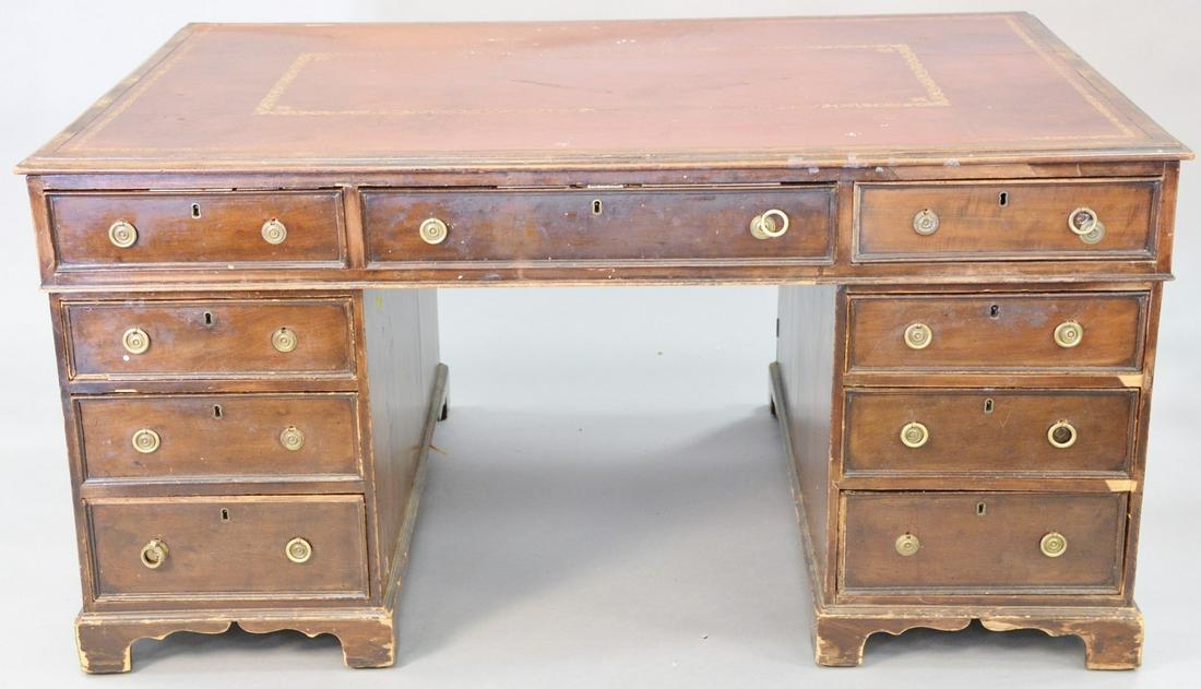 George IV mahogany double pedestal partners desk with: George IV mahogany double pedestal partners desk with tooled leather top, ht. 30", top 38" x 61".