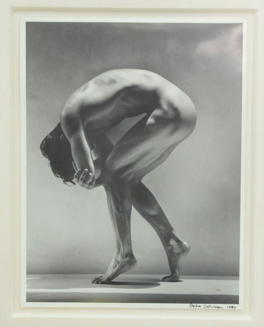 Greg Gorman (American, b. 1949), 1989, depicts male: Greg Gorman (American, b. 1949), 1989, depicts male nude kneeling , photograph, signed and dated lower right "Greg Gorman", light wear and creasing to corners, sight size: 14" x 11". Provenance: The E
