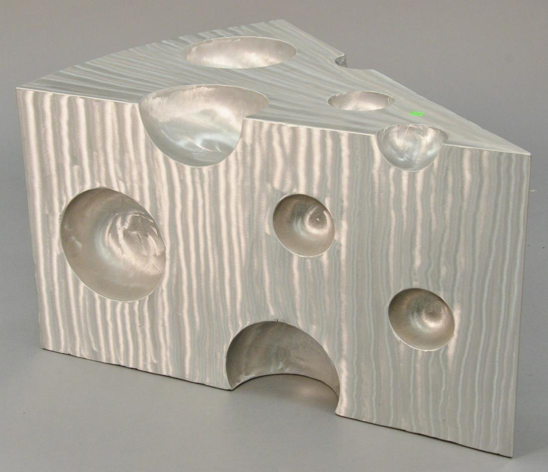 Bruce Gray (American, b.1956), "Big Cheese #5", 1999,: Bruce Gray (American, b.1956), "Big Cheese #5", 1999, aluminum swiss cheese sculpture, signed and dated, 19" h. x 33" w. Provenance: The Estate of Andrew Wolf, New Haven, CT, Arts Chief.