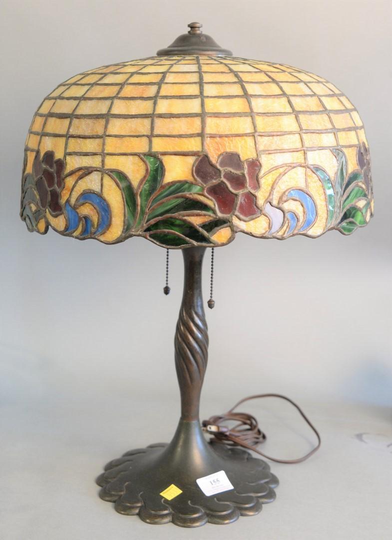 Leaded glass table lamp on bronze Handel-style base: Leaded glass table lamp on bronze Handel-style base with acorn pulls, ht. 21 1/2", shade dia. 16".