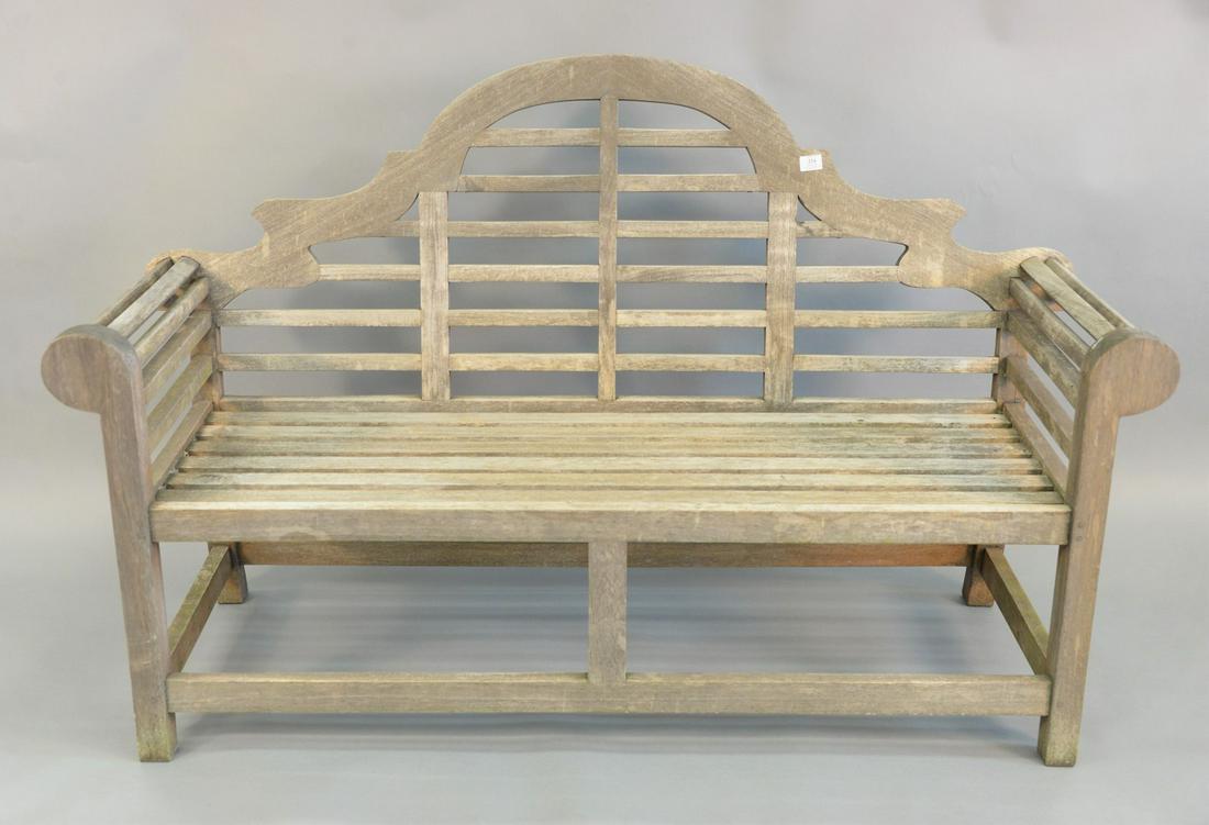Outdoor teak bench having arch top and rolled arms, ht.: Outdoor teak bench having arch top and rolled arms, ht. 41', lg. 65".