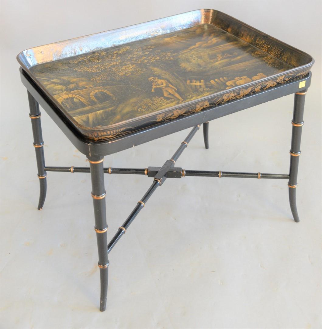 Papier-mache tea tray on faux bamboo stand, marked: Papier-mache tea tray on faux bamboo stand, marked "Illidge" sold with bill of sale from Schuskill House, ht. 20", top 19 1.4" x 26 1/4".
