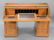 Large oak roll-top desk with fitted interior and