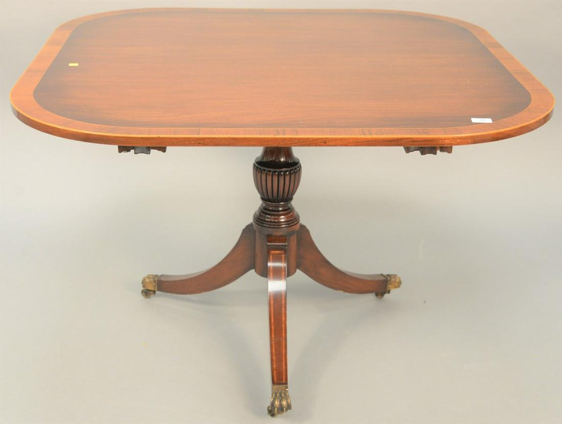 Banded inlaid dining table on pedestal base having one (1 of 4)