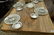 Exotic free-edge wood slab dining table in the manner - 3