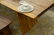 Exotic free-edge wood slab dining table in the manner - 5