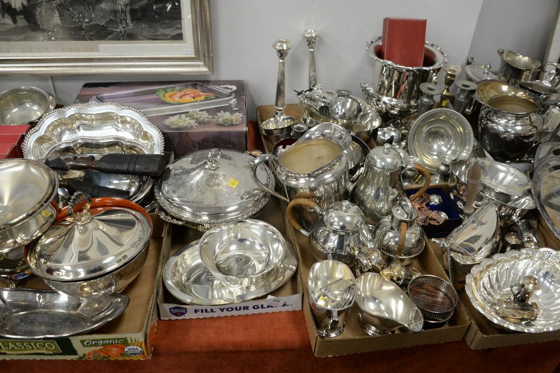 Large lot of silverplate including candlesticks, wine: Large lot of silverplate including candlesticks, wine cooler, covered dishes, bowls, liners and a humidor.