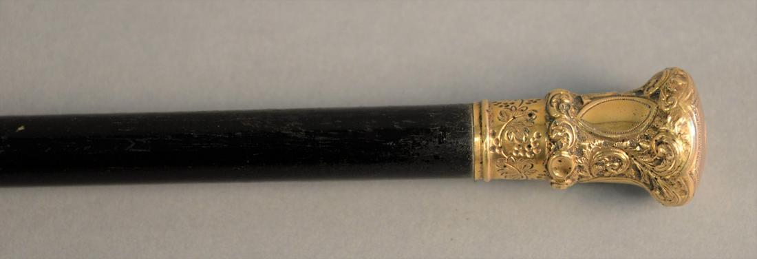 Cane with 14K gold band, ht. 34 1/2". (1 of 4)