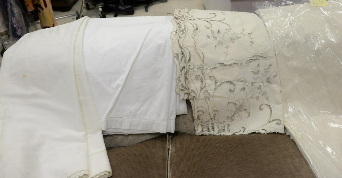 Five large tablecloths, one marked 71" x 200', cleaned. (1 of 4)