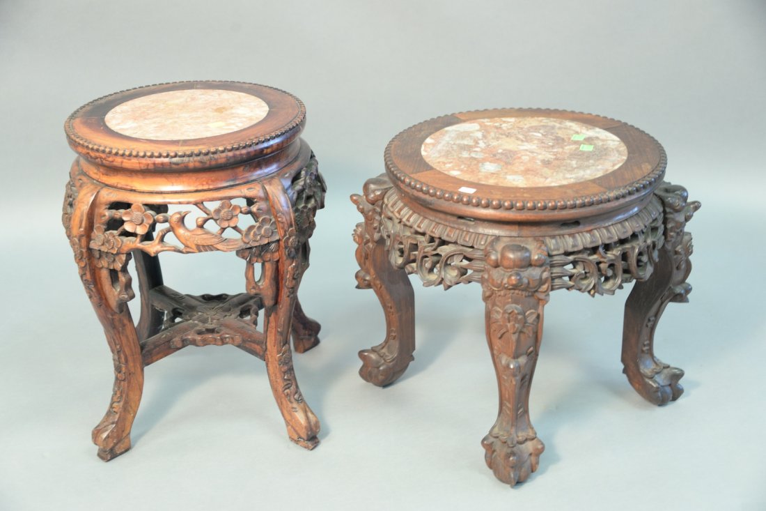 Two teak chinese stands each with inset marble tops, (1 of 2)