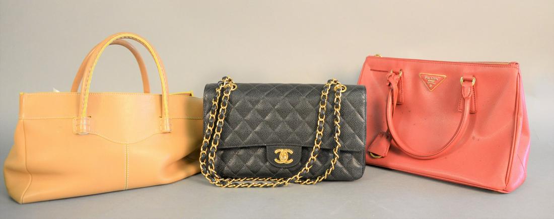 Group of four purses and wallets including: Prada red (1 of 8)