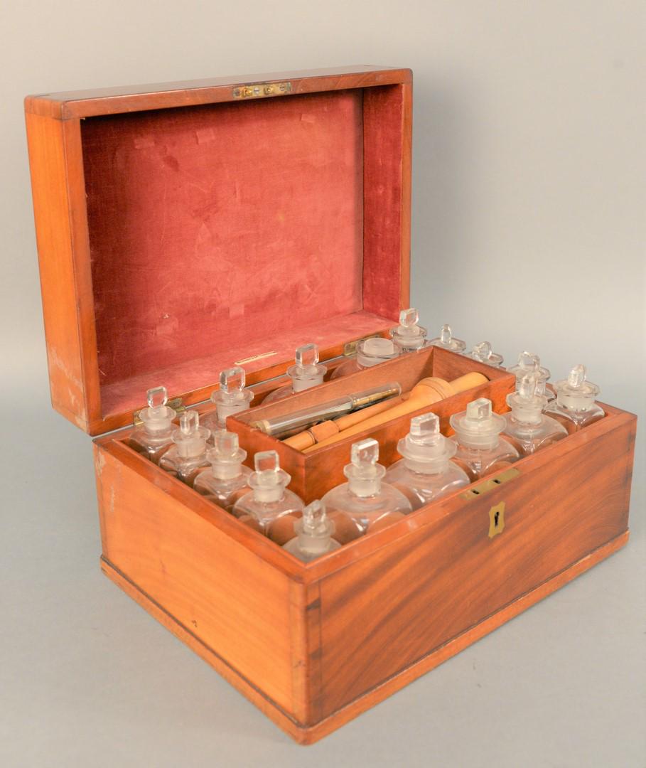 Mahogany Medical Apothecary Box, lift-top opening to: Mahogany Medical Apothecary Box, lift-top opening to fitted interior with seventeen bottle interior and removable tray, Elderfield thermometer box with Allen Hanburys thermometer box marked Lynch & Co