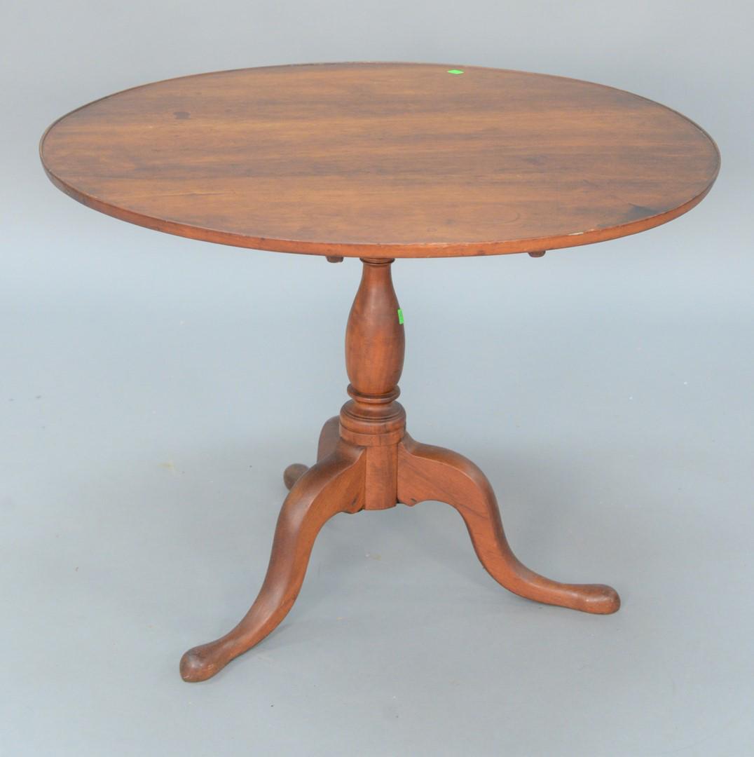 Round Cherry Tea Table, having dished top, over: Round Cherry Tea Table, having dished top, over birdcage on turned shaft all set on tripod base.height 27 inches, top 34 3/8" x 35 5/8".