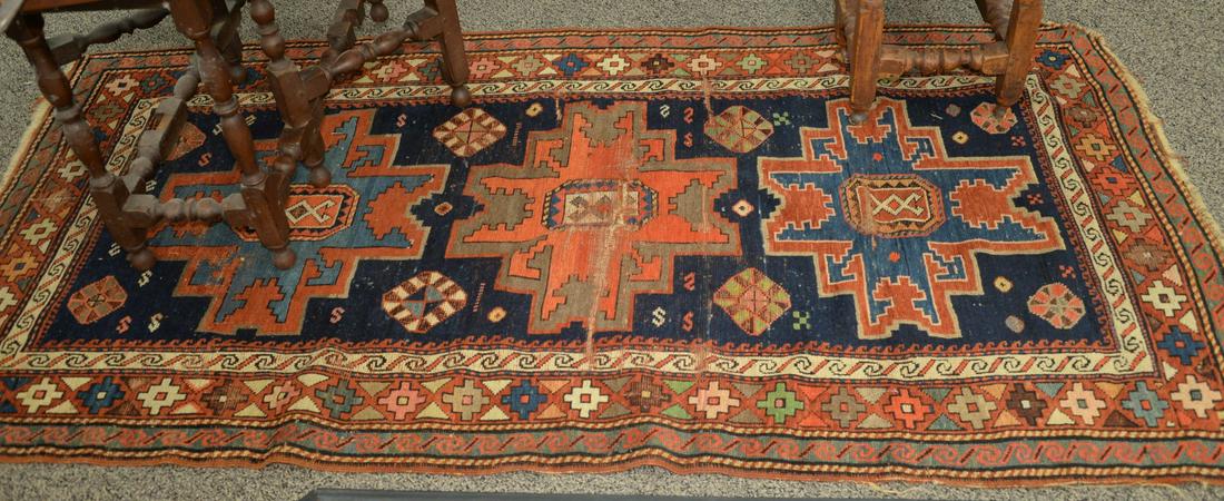 Caucasian Oriental Throw Rug, worn through line in: Caucasian Oriental Throw Rug, worn through line in middle.3' 7" x 8' 2".
