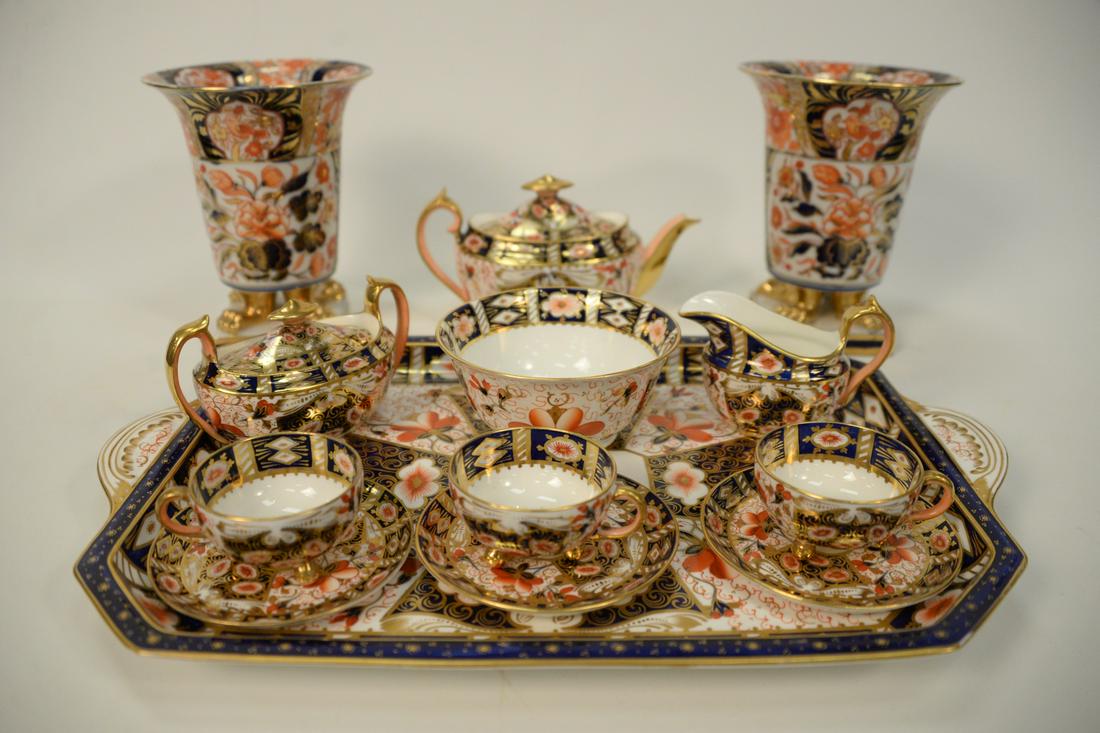 Fifty-one piece group of Imari Porcelain, 2 serving: Fifty-one piece group of Imari Porcelain, 2 serving trays; teapot; creamer; sugar; plates; Royal Worcester cups and saucers, etctray 12 1/2" x 19".