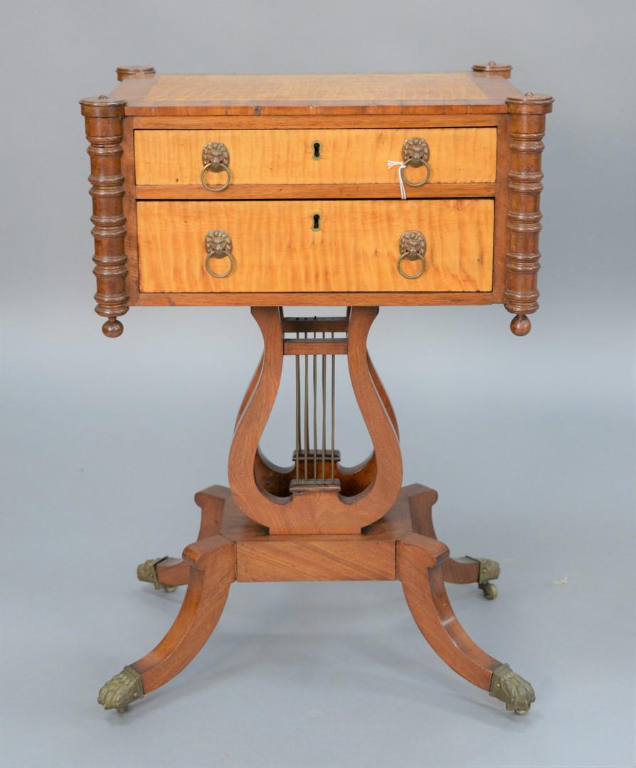 Duncan Phyfe Work Table having turret corners and two: Duncan Phyfe Work Table having turret corners and two drawers on lyre base set on four downswept members ending in brass paw feet with panel top of tiger maple and having tiger maple drawer fronts, ci