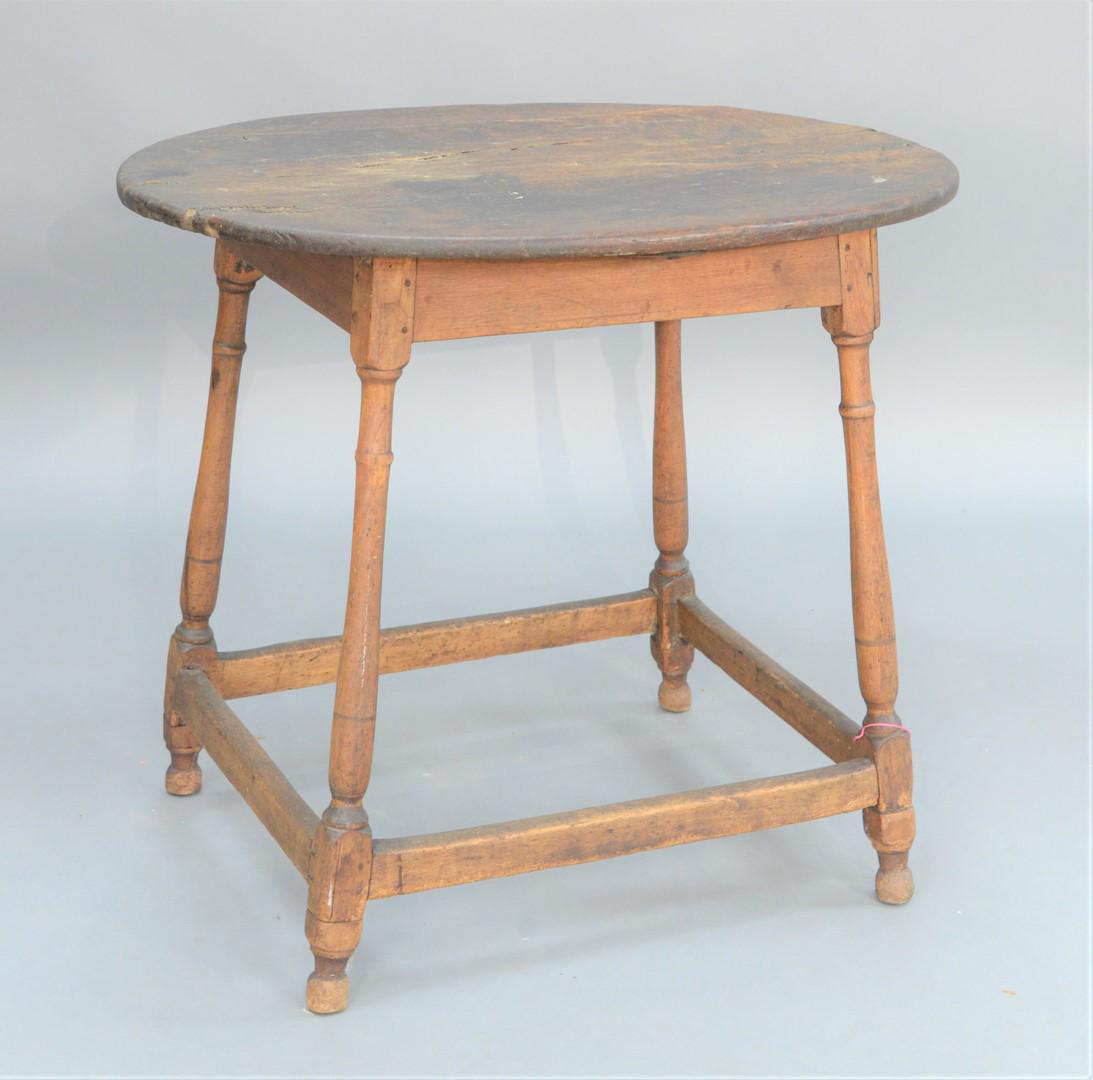 Tavern Table with Oval Top on four splayed and turned: Tavern Table with Oval Top on four splayed and turned legs with box stretcher, circa 1740, probably Connecticut, (feet replaced). height 29 inches, top 26 1/4" x 33 3/4". Provenance: The Vincent Famil