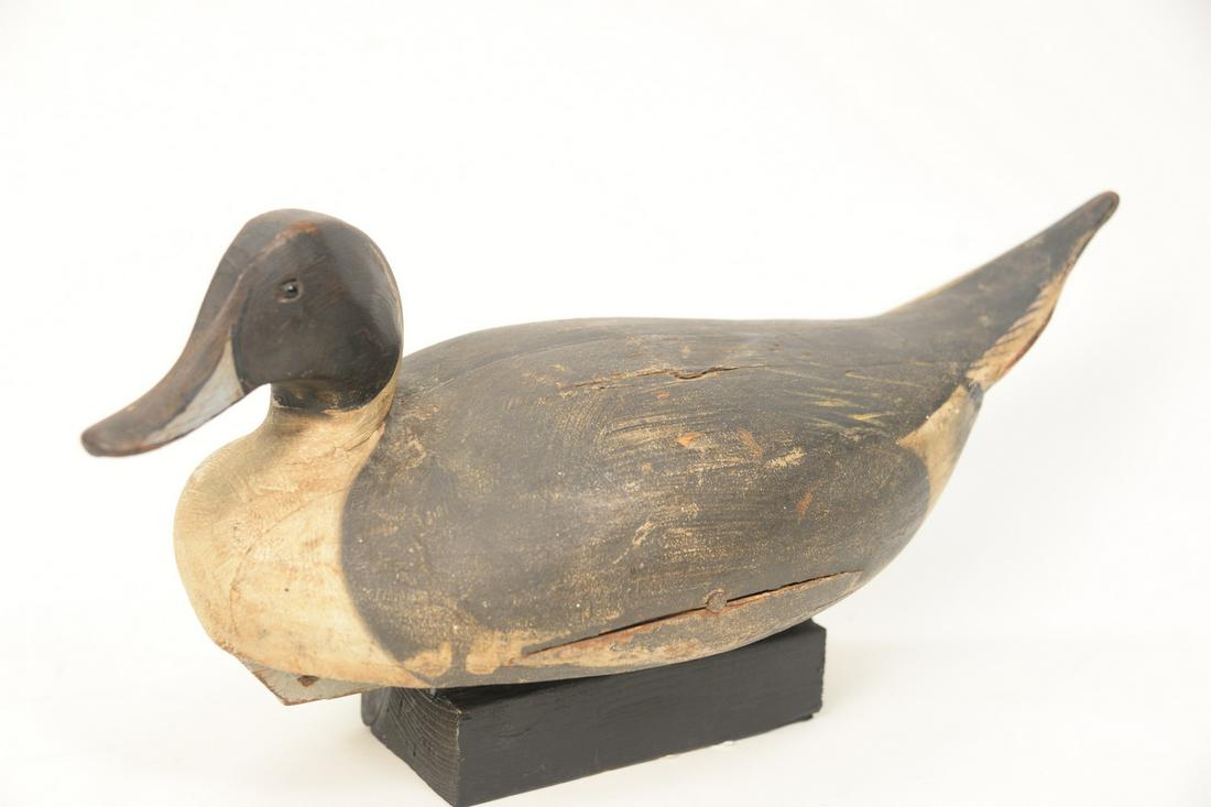 Ward Brothers Pintail Drake Decoy, Crisfield, Maryland,: Ward Brothers Pintail Drake Decoy, Crisfield, Maryland, 1948, original paint, turned head (worn), desirable model, signed "Steve and Leon Ward", (crack on left side near bottom and seam separation rea