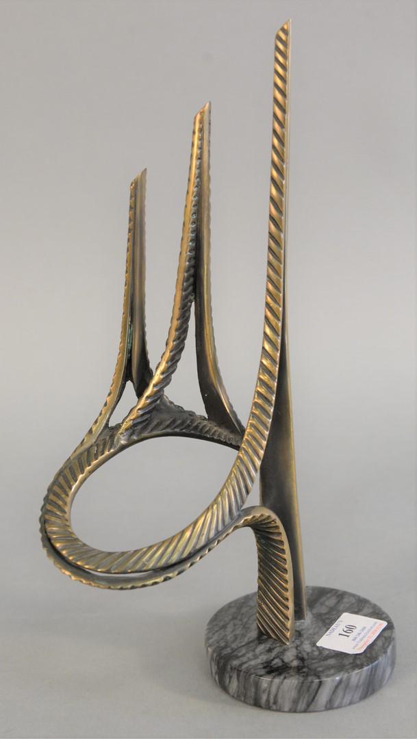 Bob Bennett (20th Century), abstract bronze sculpture: Bob Bennett (20th Century), abstract bronze sculpture on round marble base, signed, numbered '43/300', and dated 1988 on the side, 13 1/2" x 8" x 4".