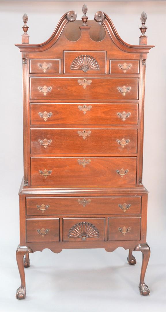 Beacon Hill Chippendale-style mahogany highboy having: Beacon Hill Chippendale-style mahogany highboy having bonnet top and fan carved drawers, ht. 77", wd. 55 1/2", dp. 21".