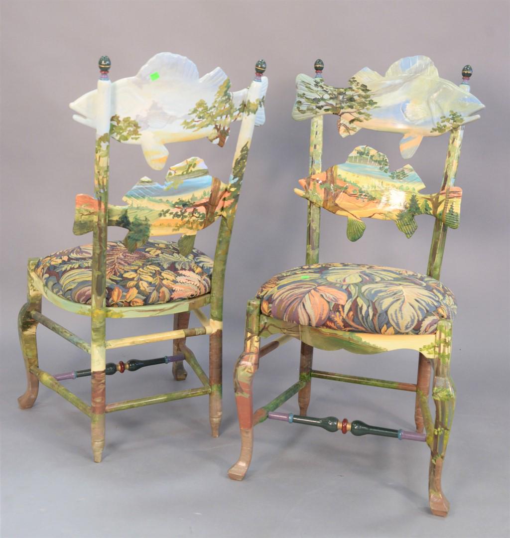 Two Mackenzie Childs "Forest Fish" chairs, hand painted: Two Mackenzie Childs "Forest Fish" chairs, hand painted maple frame, images of Cayuga Lake, New York, each marked to the underside, ht. 42" each.