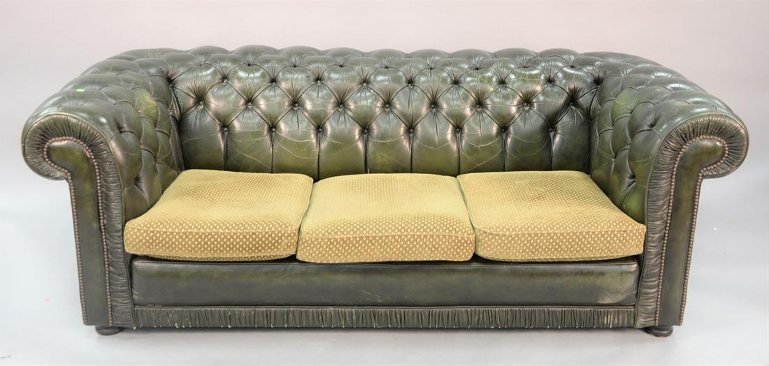 Pair of Chesterfield style green tufted leather sofa: Pair of Chesterfield style green tufted leather sofa and armchair, green upholstered cushions, 28 1/2" x 81" x 33 1/2".