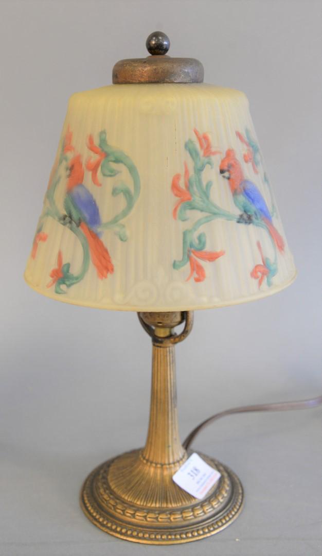 Reverse painted boudoir lamp shade, parrot motif and: Reverse painted boudoir lamp shade, parrot motif and brass base, not signed. 13" x 7". Provenance: The Estate of Ed Brenner, Short Hills, New Jersey.