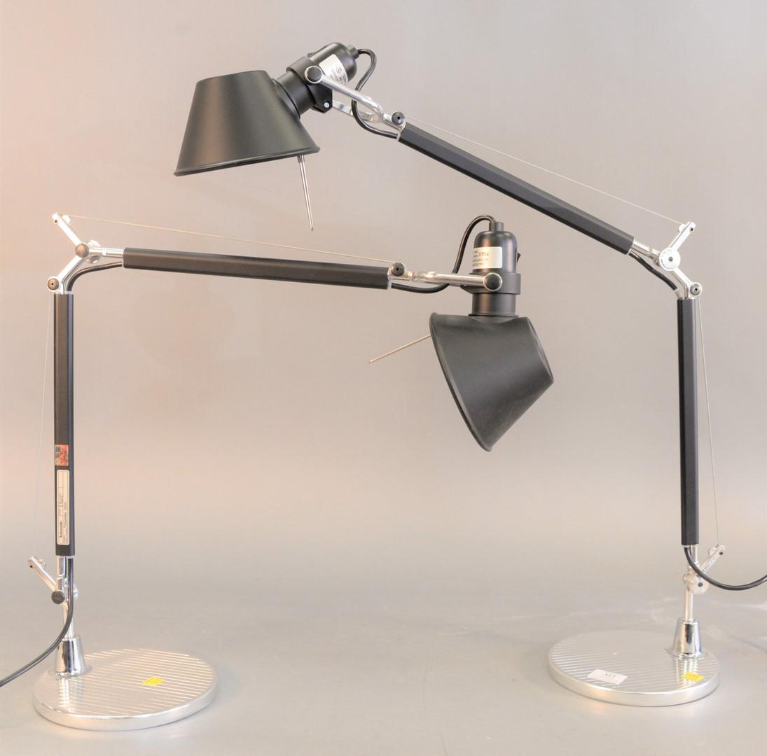 Two Artemide Tolomeo Mini adjustable table lamps,: Two Artemide Tolomeo Mini adjustable table lamps, designed by M. de Lucchi and G. Fassina, ht. 41", dia. 7 1/2".