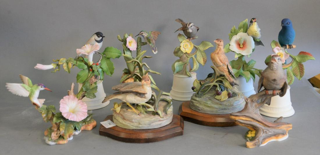 Group of nine porcelain birds, Boehm hummingbird and: Group of nine porcelain birds, Boehm hummingbird and morning glory, two Cybis birds on wooden stands, Boehm sparrows, and five Boehm birds with flowers, Boehm birds marked to the underside, hts. 11" t