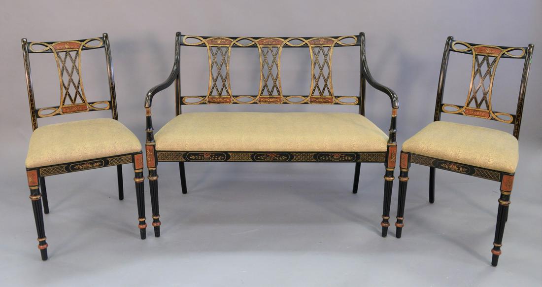 Three piece Southwood set, settee and two side chairs: Three piece Southwood set, settee and two side chairs with cloth faux lizard hyde upholstery, black and gold decorated, ht. 35" each, bench lg. 43 1/4". Provenance: Estate of William and Teresa Patton
