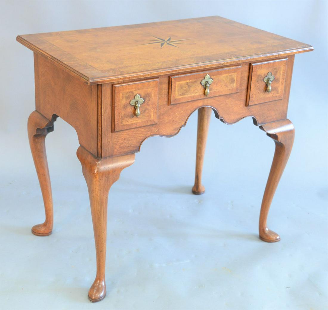Georgian burl walnut lowboy, slat invalid center with: Georgian burl walnut lowboy, slat invalid center with banded inlaid edges over three drawers on slipper feet, ht. 27" , top- 19" x 36". Provenance: Estate of William and Teresa Patton, Lake Ave Greenw