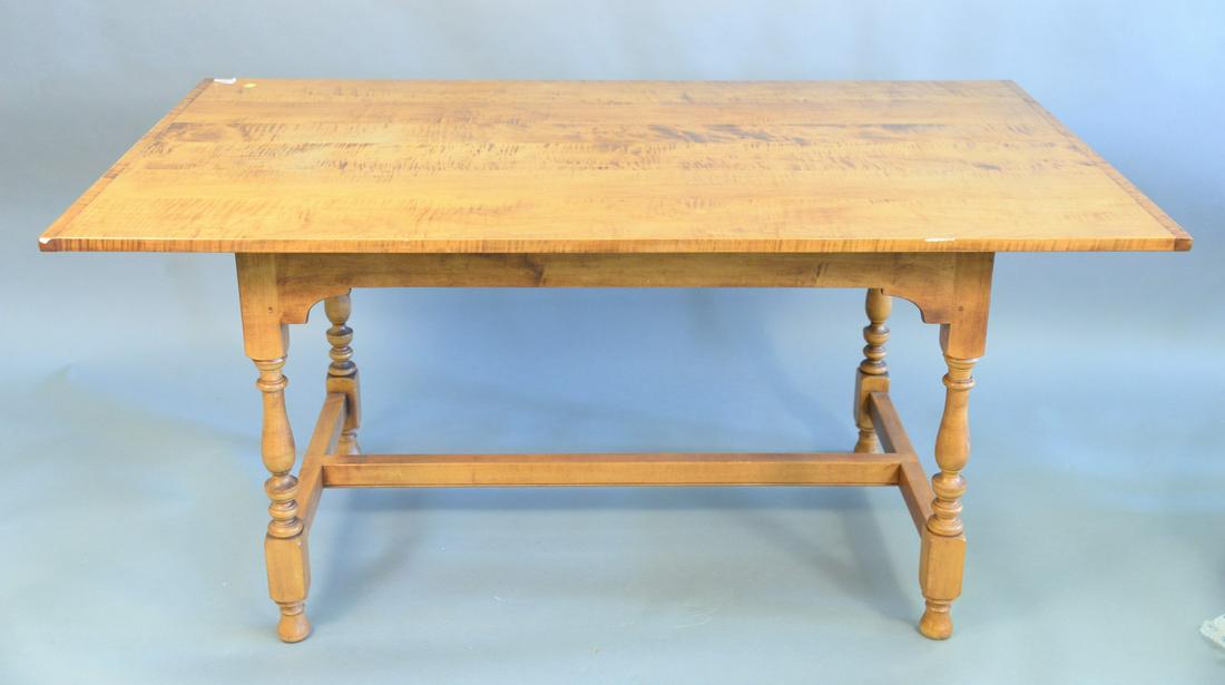 D.R. Dimes Windsor style dining table having tiger: D.R. Dimes Windsor style dining table having tiger maple top, stretcher base, and extendible leaves for each end, ht. 29 1/2", top 36" x 62". Provenance: Estate of Dr. Thomas & Alice Kugelman, Bloomfi