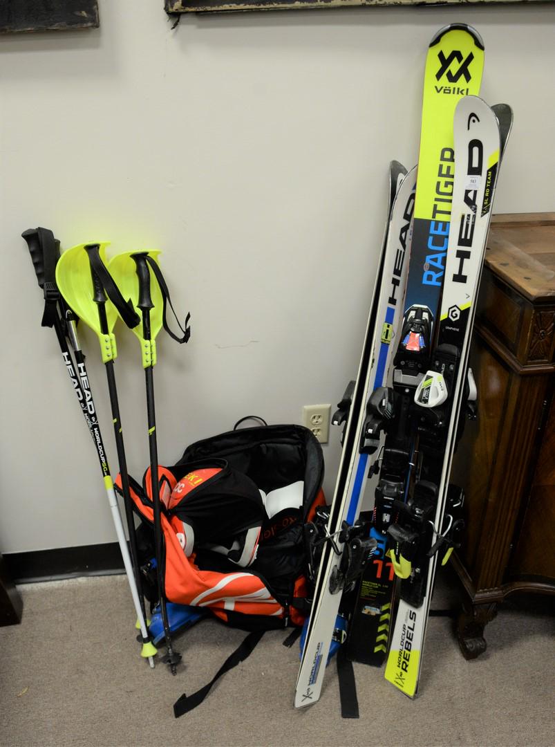 Group of children's snow skis, boots, helmets and: Group of children's snow skis, boots, helmets and poles, sizes vary.