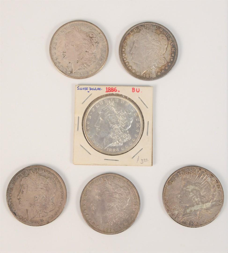 Six silver dollars to include, 1928 Peace dollar UF, (1 of 3)