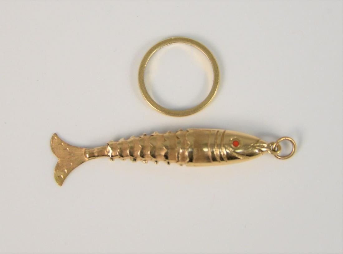 18k gold fish and ring, 5.7 gr. Provenance: Estate of (1 of 3)