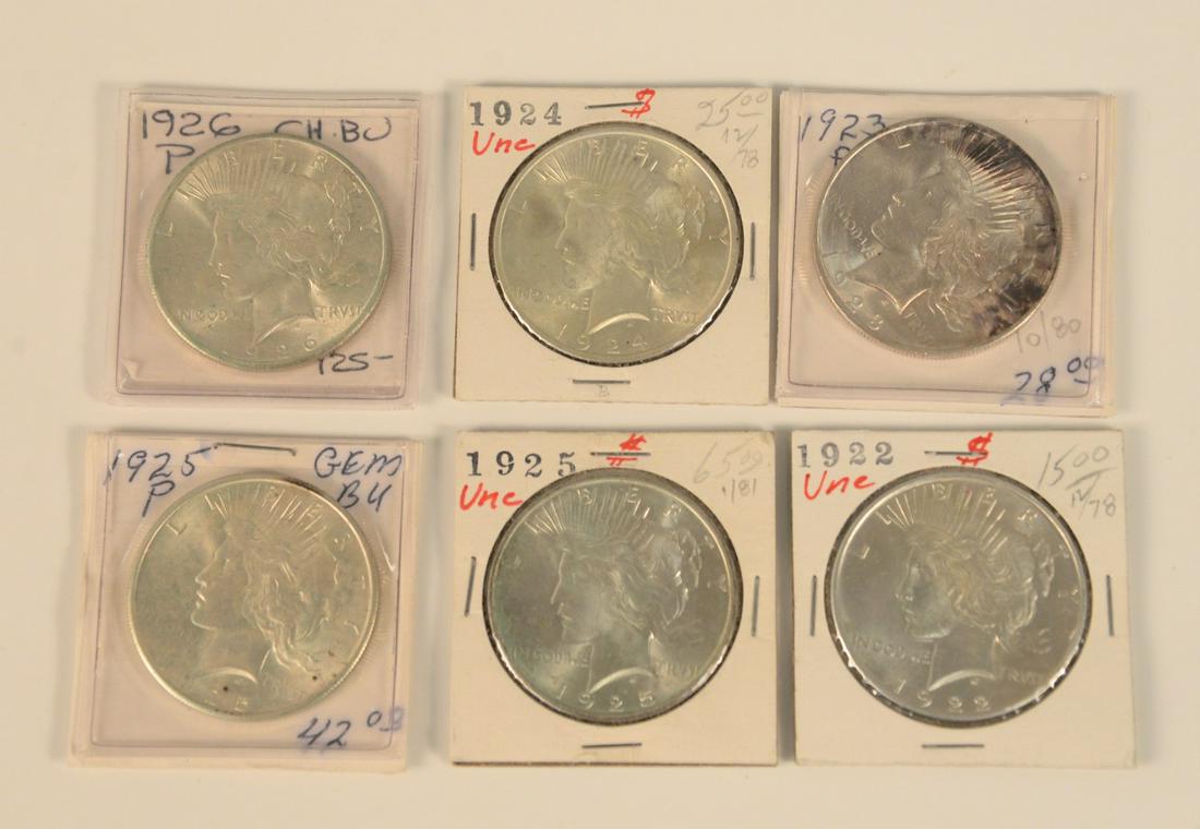 Six silver dollars, all uncirculated and choice (1 of 4)
